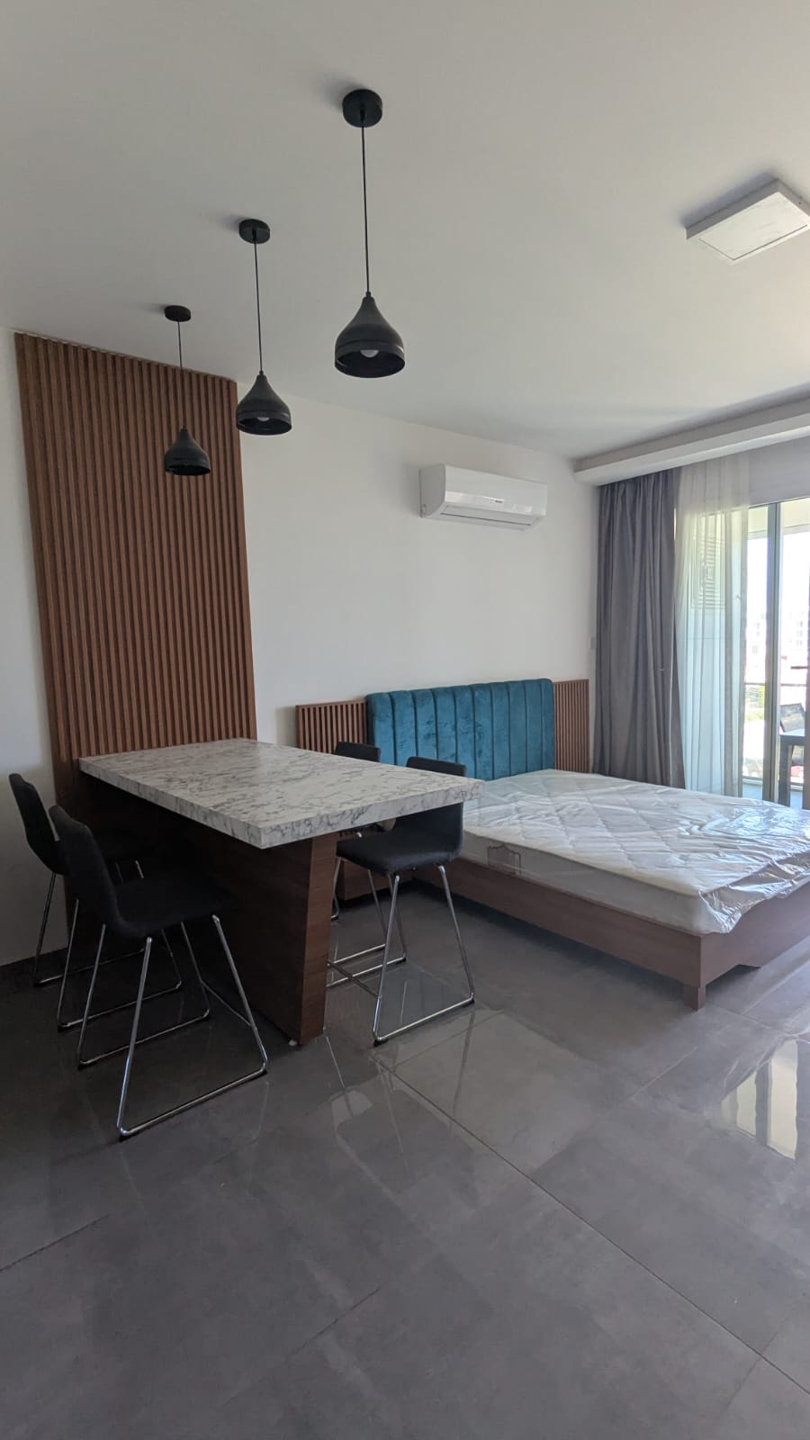 Matching bed area for a studio apartment